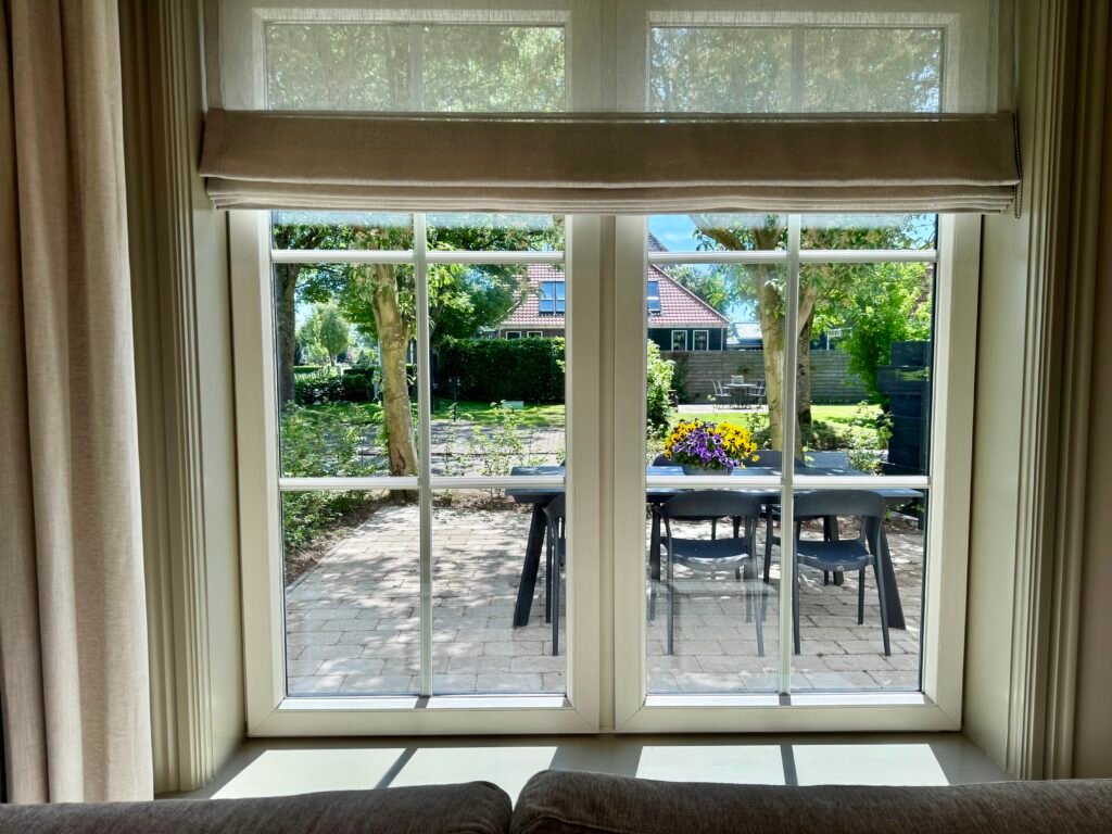 Vakantiehuis Het Stamhuisje - Uitzicht op terras vanuit woonkamer
